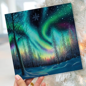 Cartes de Noël aurores boréales Belle scène de neige hivernale Paysage enneigé Cartes de Noël aurore boréale verte pour les amis de la famille Vacances 2025