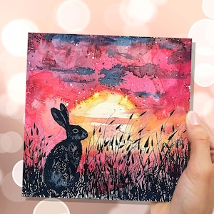 Sonnenuntergang Kaninchen Silhouette Osterkarte Wildblumen Natur Kunst für Landschaftsliebhaber Aquarell Sommerszene Eco Freundlich Hellrosa Hase
