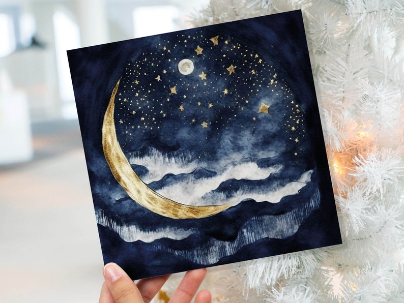 May include: A watercolour painting of a crescent moon with gold accents against a dark blue night sky with gold stars. The moon is set against a backdrop of white clouds.
