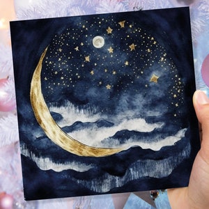 May include: A watercolour painting of a crescent moon with gold accents against a dark blue night sky with white clouds and gold stars.