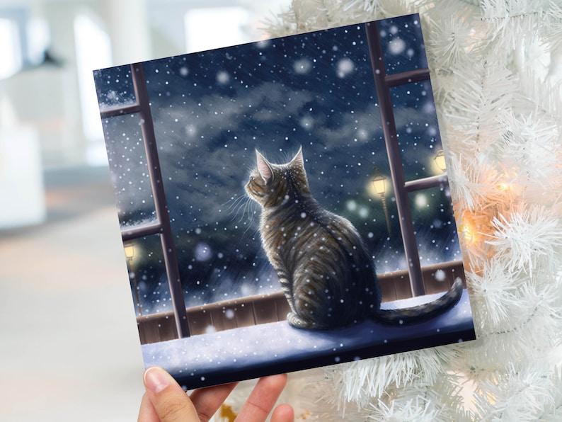 Cat Christmas Card Cute Kitten Watching Snow Fall Tabby Snowy Window Winter Night Scene Falling Whimsical Greetings Family Friends Xmas 2023 image 1