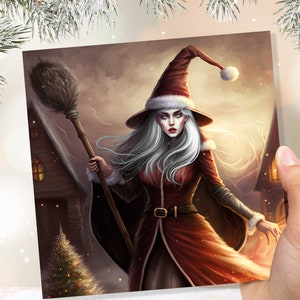 Carte de Noël femme père Noël sorcière La Befana sorcière fantastique gothique goth païen chapeau pointu Conte de fées féminisme féminin famille amis Noël 2025