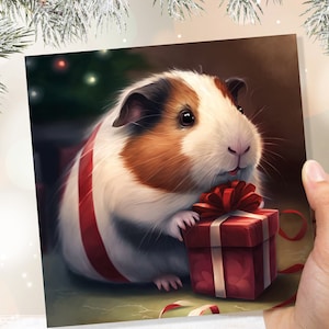 Jolie carte de Noël avec un cochon d'Inde à offrir en cadeau Salutations amusantes et uniques pour les fans de cavy, amis de la famille, Noël 2025, lot de 1 ou 10 propriétaires, enfants