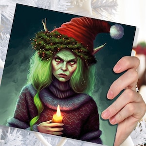 Carte de Noël Krampus femme visage de sorcière au repos horreur de sorcière gothique goth païen bonnet de noel sombre fantaisie salutations amis de la famille Noël 2025