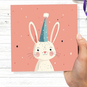 Lapin blanc carte célébration chapeau de fête joyeux 1er anniversaire pour fille joli bébé lapin de Pâques lièvre vierge salutations invitation rose pastel