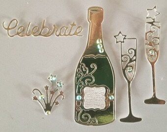 Die cut 'Celebrate' champagne bottle, fizz, glasses/flutes. 5pc set in silver or gold, gem embellishments. Hand finished luxury card toppers