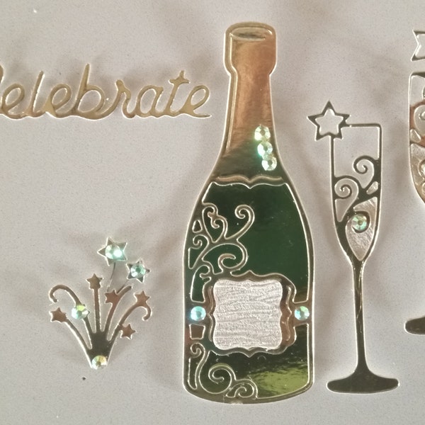 Die cut 'Celebrate' champagne bottle, fizz, glasses/flutes. 5pc set in silver or gold, gem embellishments. Hand finished luxury card toppers