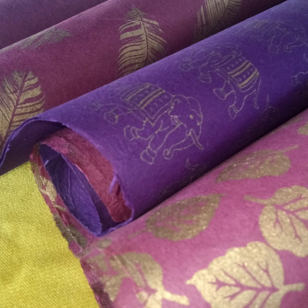 3 large sheets Nepali lokta paper, deckle edged. Gorgeous rich purple and burgundy colours with gold block printed designs.