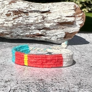 Woven bracelet made of linen - turquoise - coral