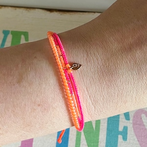 Bracelet neon pink orange made of glass beads multi-row