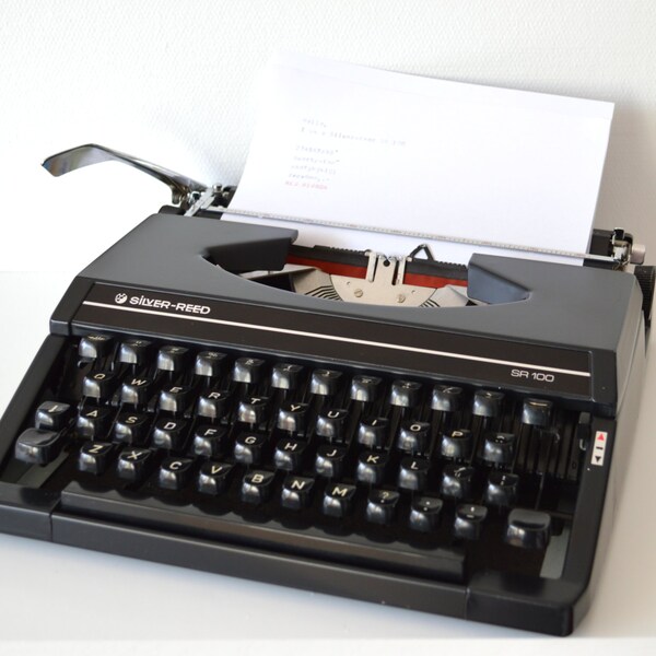 Stylish black Silver-Reed SR100 good working Typewriter