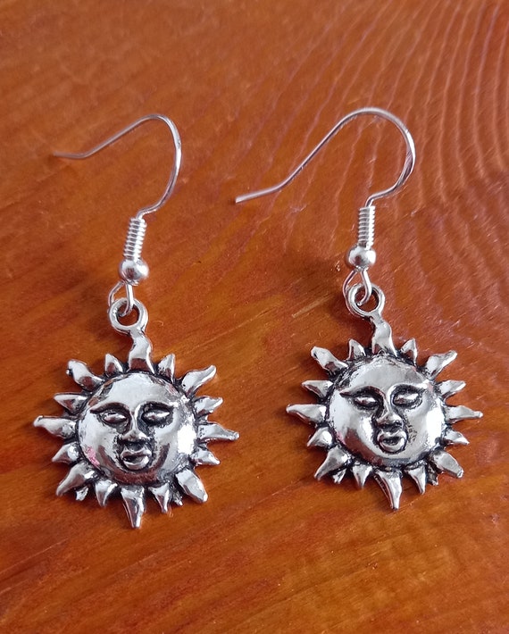 Tibetan sun charm earrings