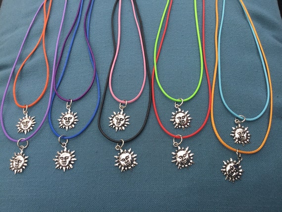 Tibetan Sun charm cord necklace