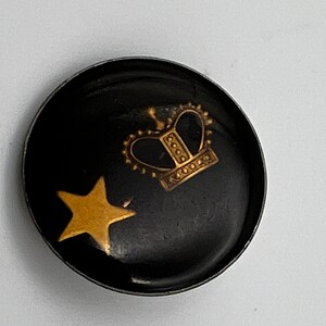 Button ,vintage, black  with gold crown and star, singed Handy 45, collectors button