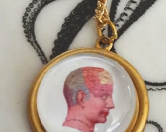 Phrenology head necklace