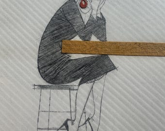 May include: A pencil sketch of a person seated at a stool, with hands covering the face. The person wears a dark dress and high heels. A wooden ruler is placed in front of the person. The drawing is on a white background with diagonal lines.