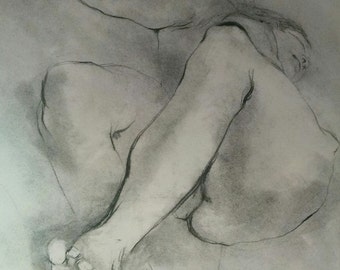 May include: A black and white charcoal drawing of a nude figure in a seated pose.