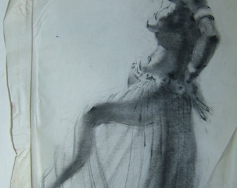 May include: A charcoal sketch of a dancer in a flowing skirt, captured in a dynamic pose. The artwork, rendered in shades of gray, showcases the dancer's form and movement. The sketch is on a textured, off-white paper.