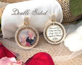 May include: Double-sided gold-tone pendant with a clear crystal halo. One side features a photo of an older couple, and the other side has a message that reads "Mom and Dad, Today is the Day I say I do. I carry this in Memory of You."