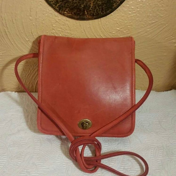 burnt orange coach purse