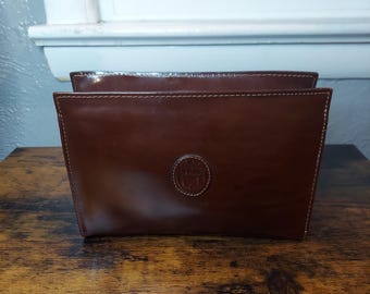 Vintage leather KEM clutch purse.