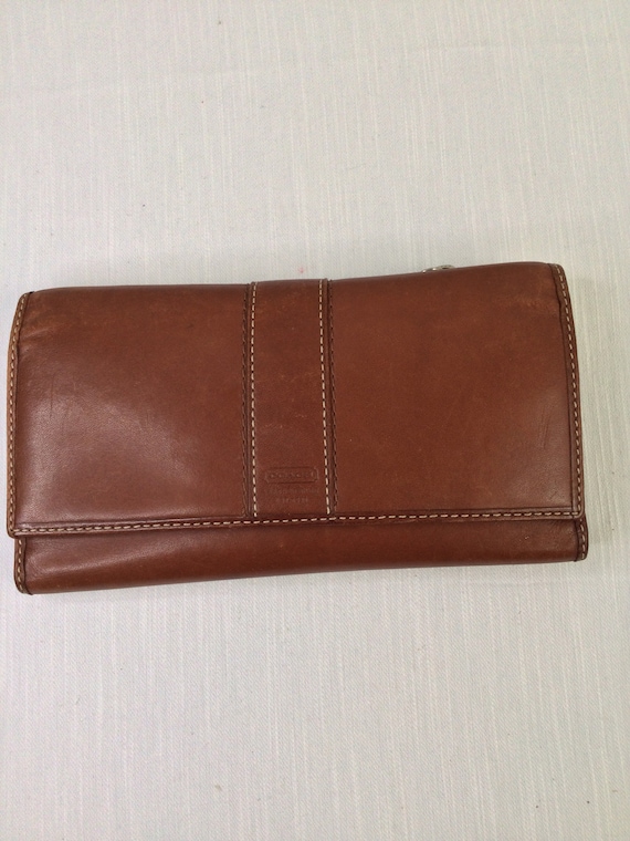 Vintage Coach leather tri-fold ladies wallet.
