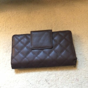 Vintage Buxton brown leather ladies bifold wallet.