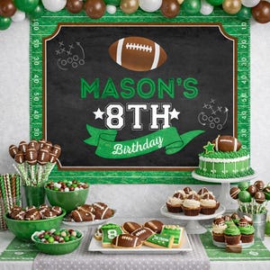 May include: A football-themed birthday party setup with a chalkboard backdrop. The chalkboard reads "MASON'S 8TH Birthday" with a football graphic. The table features football-shaped cake pops, cookies, cupcakes, and a green and white cake. Balloons and a football field runner complete the decor.