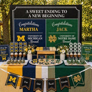 May include: A graduation party table with a banner that reads "For Our Sweet Grads." The table is decorated with cupcakes, cookies, and signs for Martha and Jack, with the University of Michigan and Notre Dame logos. The backdrop reads "A Sweet Ending to a New Beginning."