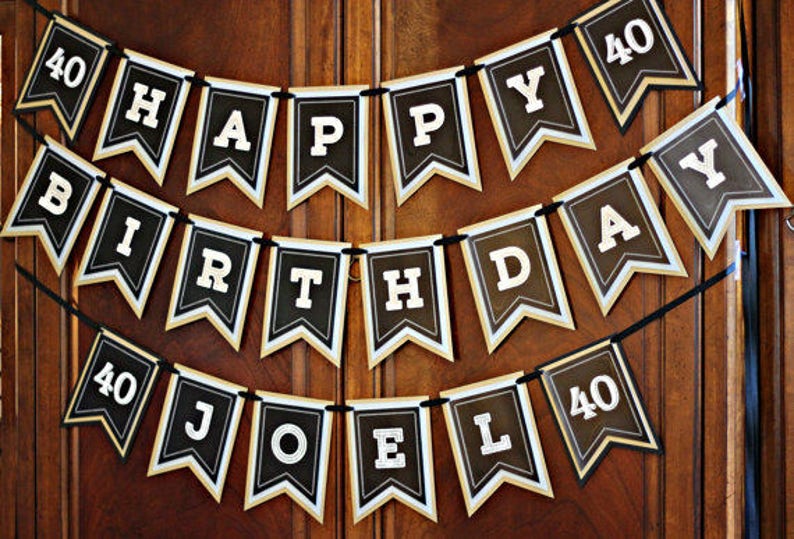 May include: Black and gold banner with the text "Happy 40th Birthday Joel".