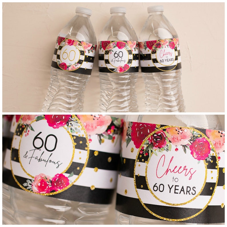 May include: Three clear plastic water bottles with black and white striped labels featuring pink floral designs and gold glitter. The labels have the text "60 & Fabulous" and "Cheers to 60 Years".