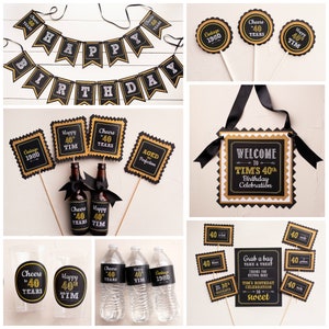 May include: Black and gold party decorations for a 40th birthday celebration. The decorations include a banner, signs, cupcake toppers, and water bottle labels. The text on the decorations says "Happy 40th Birthday", "Cheers to 40 Years", "Happy 40th Tim", "Vintage 1980", and "Aged to Perfection".