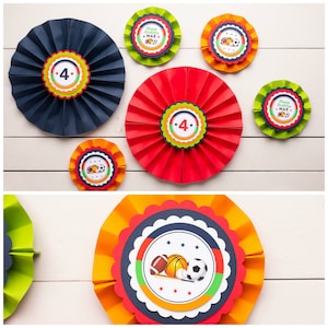 May include: A set of six colorful paper fan decorations with a sports theme. The fans are decorated with images of baseballs, basketballs, footballs, and bats. The fans also feature the number "4" and the text "Happy Birthday Max".