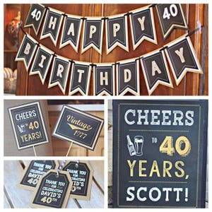 May include: Black and gold 40th birthday party decorations with a vintage theme. The decorations include a banner, signs, and tags. The banner says "Happy Birthday". The signs say "Cheers to 40 Years" and "Vintage 1977". The tags say "Thank You for Celebrating David's 40th".