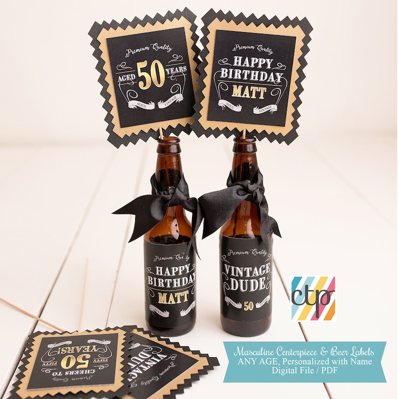 May include: Two black and gold printable beer bottle labels with the text "Happy Birthday Matt" and "Vintage Dude 50".  Two black and gold printable table toppers with the text "Aged 50 Years" and "Happy Birthday Matt".