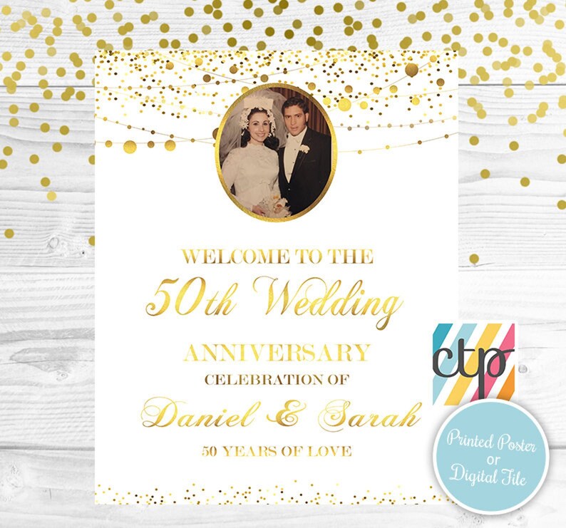 May include: Gold glitter background with a white sign that says "Welcome to the 50th Wedding Anniversary Celebration of Daniel & Sarah 50 Years of Love". A black and white photo of a couple is in the upper left corner of the sign.