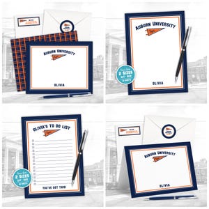 May include: A stationery set with Auburn University branding, including notepads, envelopes, and stickers. The design features navy blue and orange accents, with the name "Olivia" printed on the items. Available in two sizes: 12.7 x 17.8 cm and 20.3 x 25.4 cm.