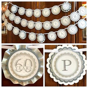 May include: A silver and white banner with the words "Happy 60th Anniversary Paul & Ann" in a circle design. There are two additional silver and white circles with the text "60 Years" and the letter "P" in a circle design.