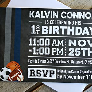 May include: A black and white chalkboard style invitation with a blue and gray stripe border. The invitation reads "Kalvin Connor is celebrating his 1st Birthday 11:00 AM: NOV -1:00 PM: 25TH Casa de Connor 34557 Crenshaw St. Beaumont, CA 92223 RSVP KristinLynn.Connor@gmail.com by November 11th". The invitation has a graphic of a soccer ball, football, and basketball.
