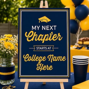 May include: A rectangular graduation sign on a wooden easel with a dark blue background and white border. The text reads "MY NEXT Chapter STARTS AT College Name Here" in yellow and white, featuring a yellow graduation cap icon at the top.