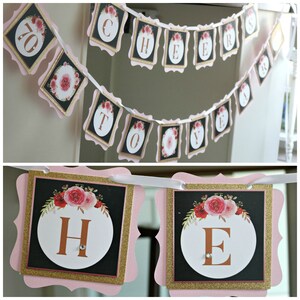 May include: Pink and black floral banner with gold glitter accents. The banner reads "Cheers to 70 Years".