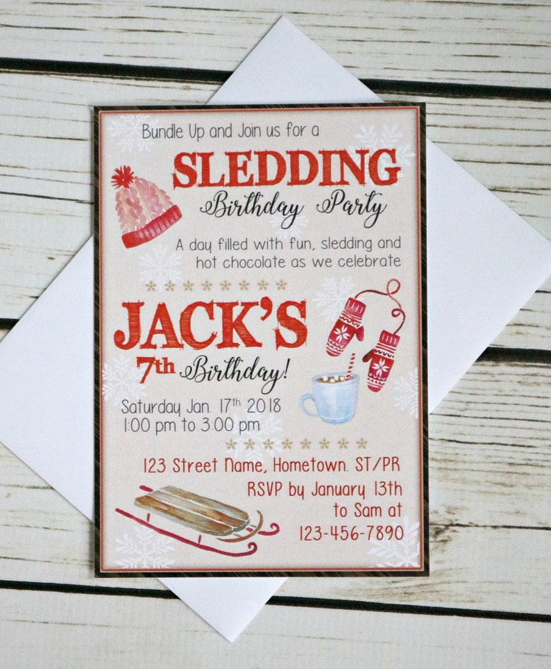 May include: A rectangular birthday party invitation card featuring a red knit hat, red mittens, a mug of hot chocolate, and a wooden sled. The text reads: Bundle Up and Join us for a SLEDDING Birthday Party, JACK'S 7th Birthday, Jan. 17th 2018, 1:00 pm to 3:00 pm, 123 Street Name, Hometown. ST/PR, RSVP by January 13th to Sam at 123-456-7890.