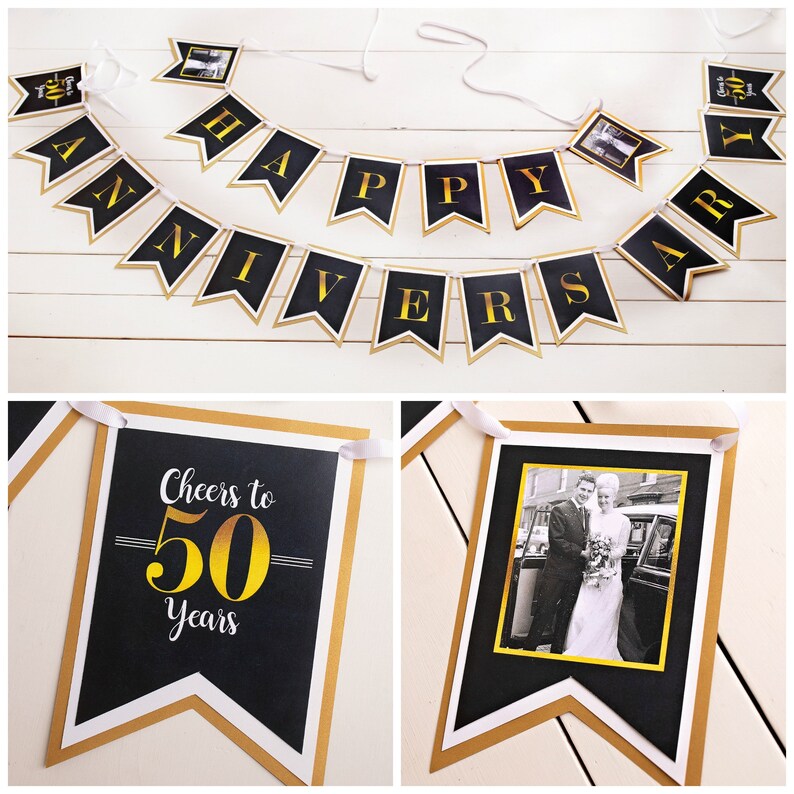 May include: Black and gold happy anniversary banner with a photo frame and a separate black and gold banner that says "Cheers to 50 Years".