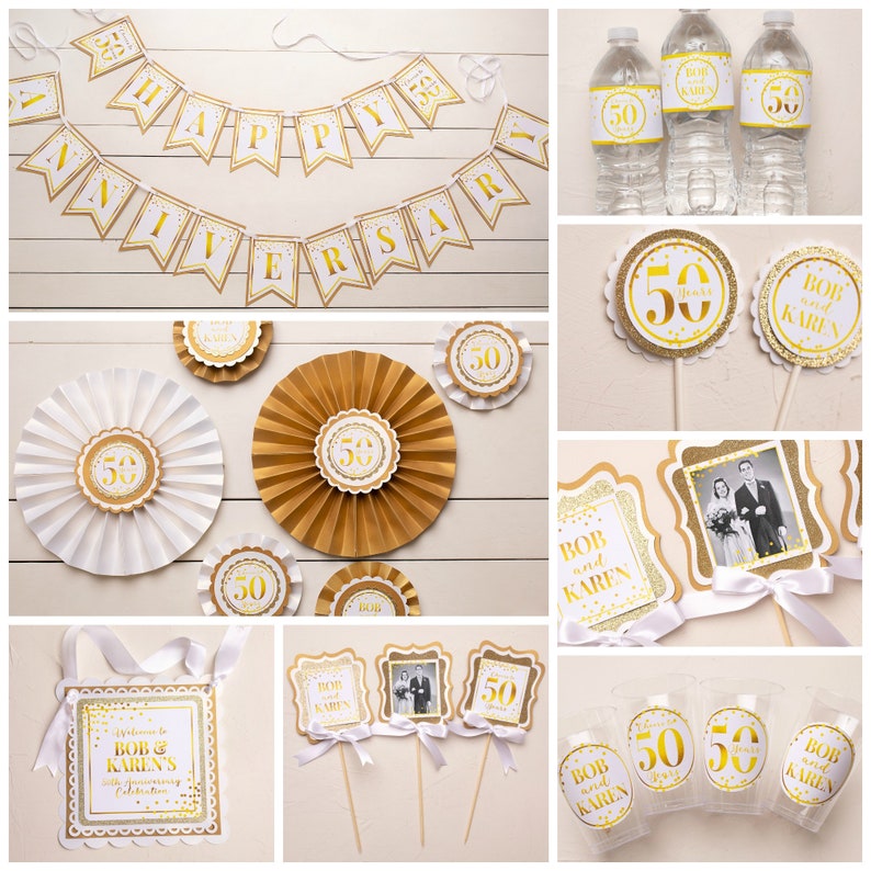 May include: Gold and white 50th anniversary party decorations. The decorations include a banner, fan decorations, cupcake toppers, water bottle labels, and a sign that says "Welcome to Bob & Karen's 50th Anniversary Celebration".