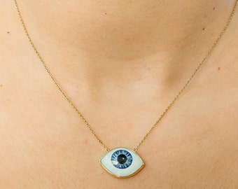 Quartz evil eye necklace in k14 gold.