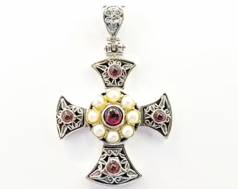 Silver cross with pearls and garnets