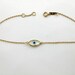 kimsyslo reviewed Evil eye bracelet in solid gold k14 with mother of pearl eye
