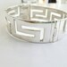 Brenda Chapman reviewed Greek key wide cuff bracelet in sterling silver 925,symbol of eternity