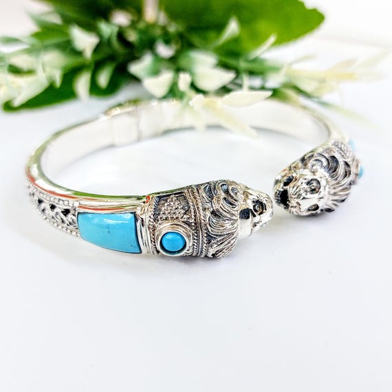 Silver lion bracelet with turquoise decorations