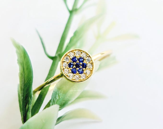 Minimal 14K gold ring with round eye theme and decorated with cubic zircon